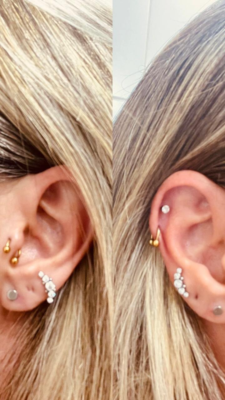 Trabalho de piercing do estúdio Paulinho Tattoo